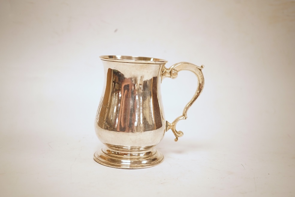 A George III silver baluster mug, by John Payne, London, 1771, height 10.2cm, 7oz.